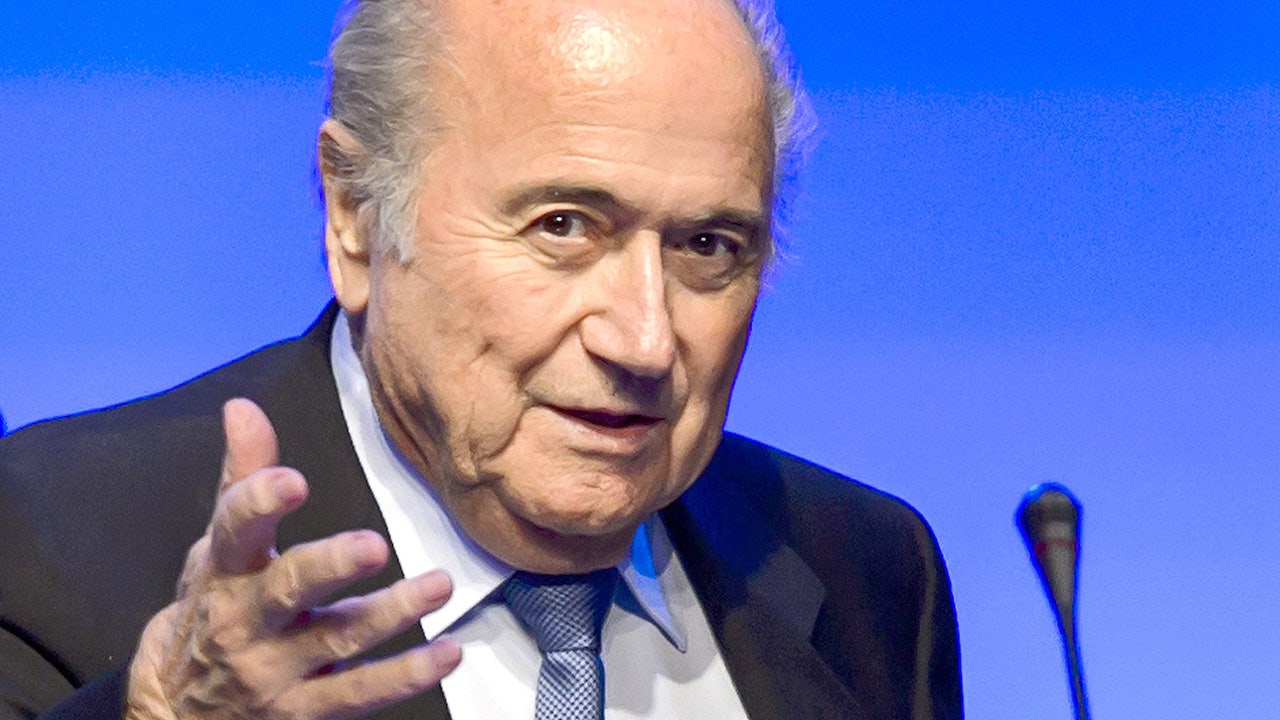 Sepp Blatter challenges critics to risk taking him on